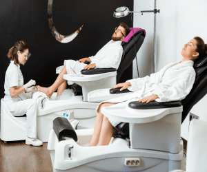 A couple getting a pedicure foot massage.